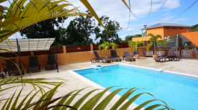 Appartement d'une chambre a Deshaies a 900 m de la plage avec piscine partagee jacuzzi et jardin clos